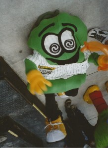 Pickle Mascot on the Ground