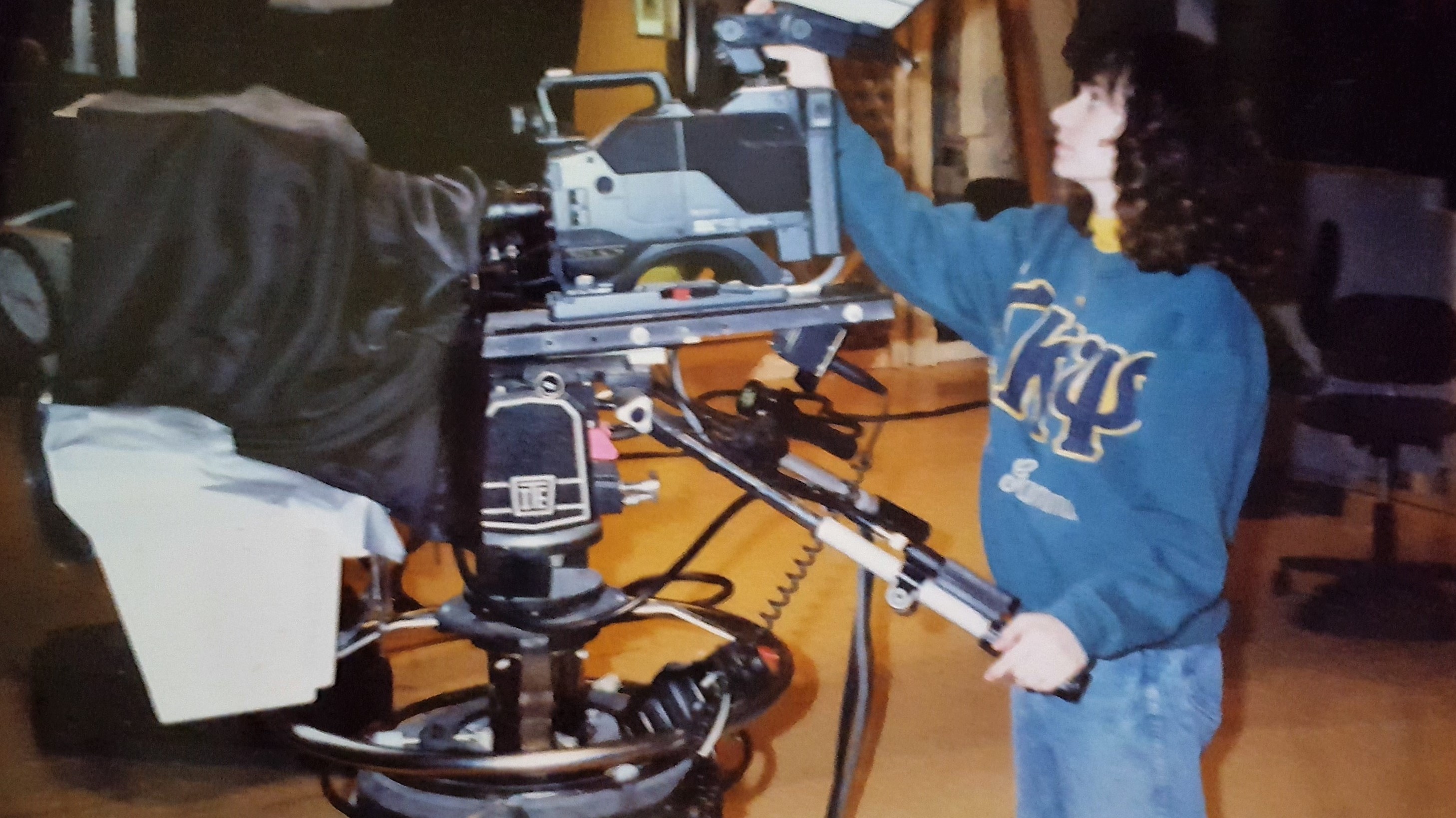Lorie adjusting a studio camera