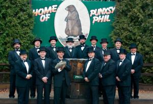 Guys in top hats with Punxsy Phil